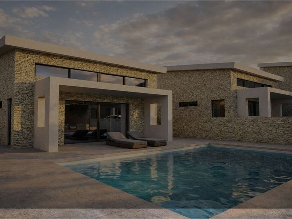 Pasha Villas interior with full-height sliding glass doors opening to the private pool terrace, Parga